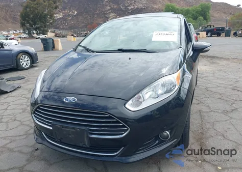 2014 Ford Fiesta Titanium из США, поврежденный, VIN 3FADP4FJ4EM206114